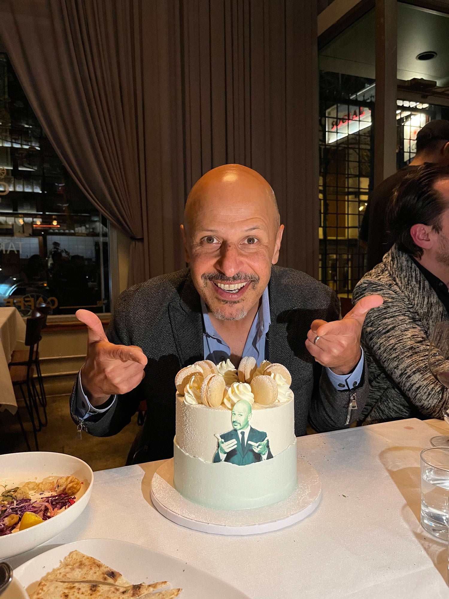Maz Jobrani loving our custom cake